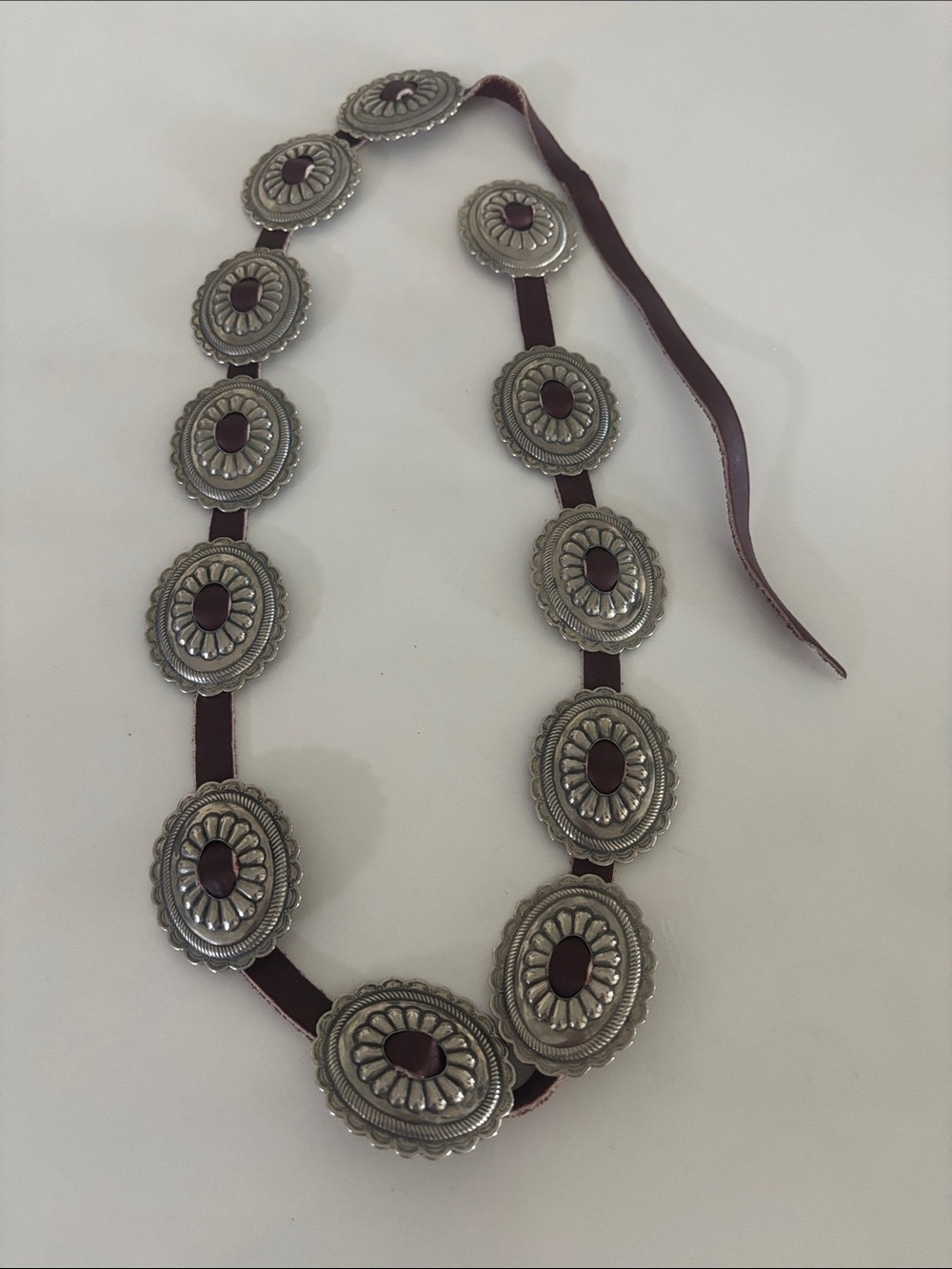 Vintage women’s southwestern metal concho leather belt